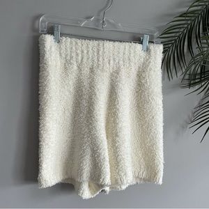 SKIMS cozy shorts size S/M. Very strechy, could fit a large for slim effect.